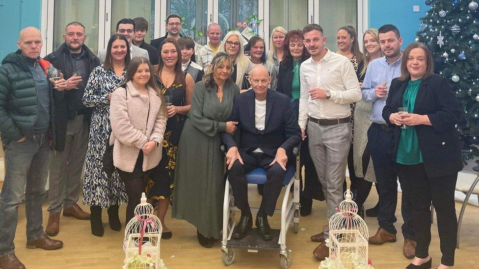 Mick and Nicola Cutforth with family and friends