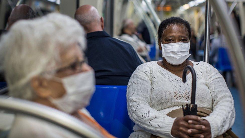 People wear protective mask on the subway on February 27, 2020 in São Paulo, Brazil.