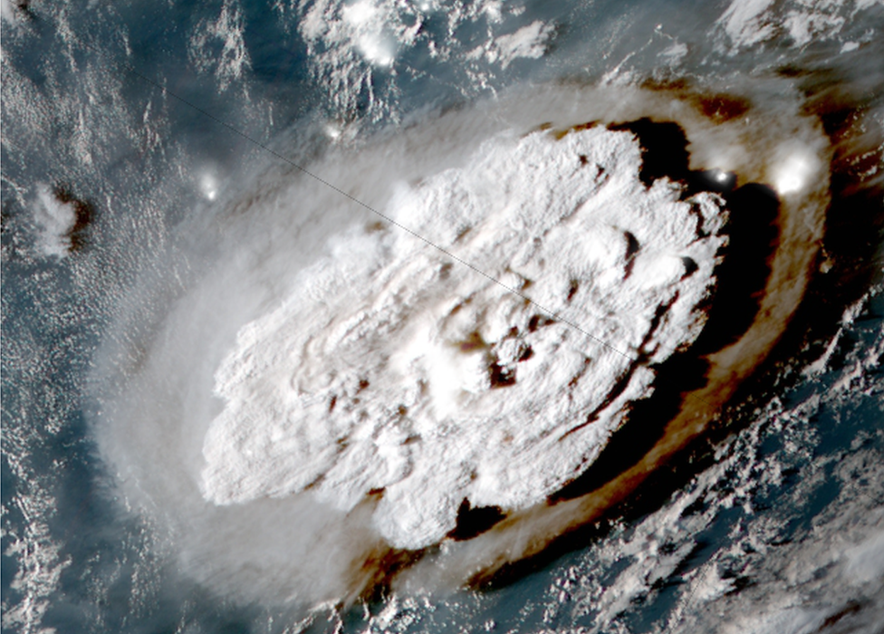 A screengrab from satellite footage showing the moment the explosion breached the sea's surface