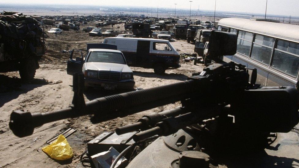 The Basra-Kuwait Highway clogged with abandoned vehicles