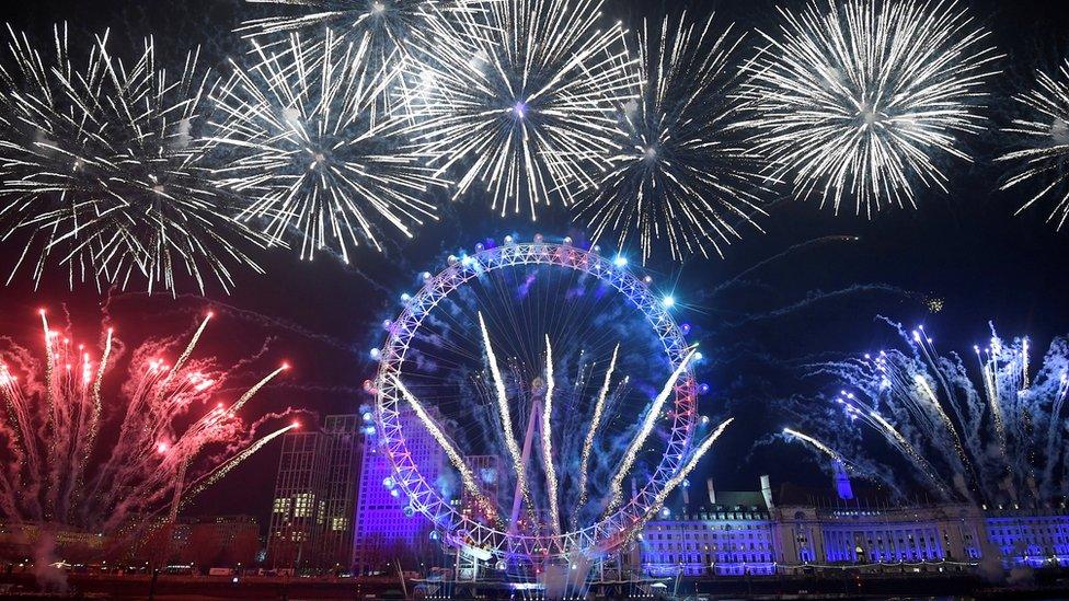 Fireworks explode over the London Eye