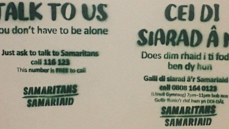 Samaritans sign in Newport police cell