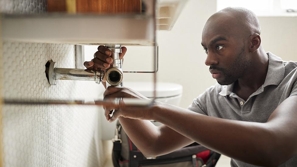 Plumber at work