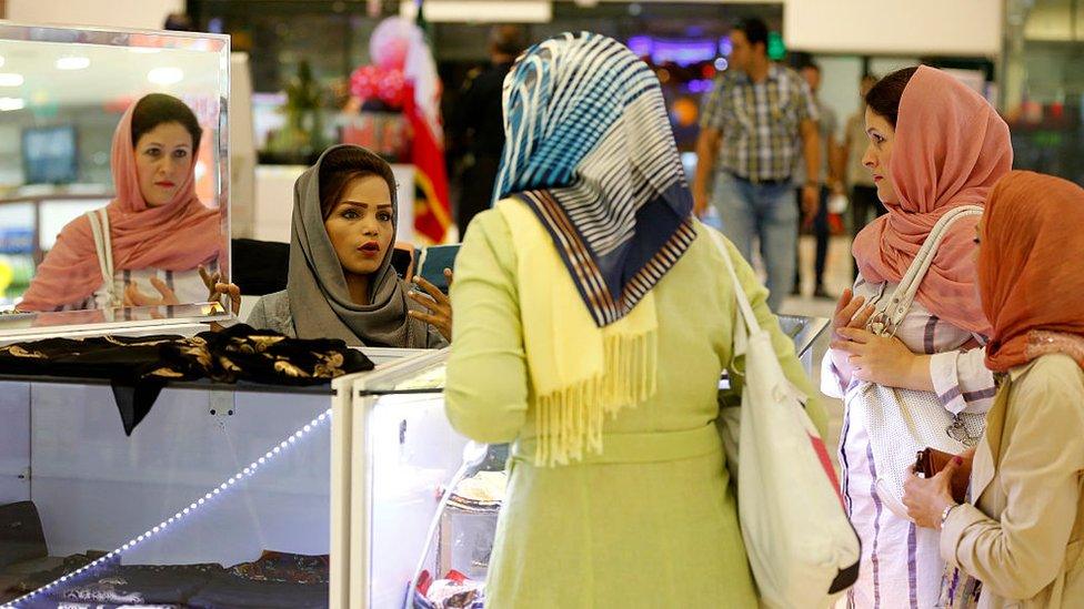 Women in a shop in Kish (file photo)