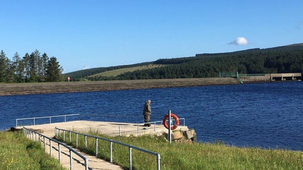 A man fishing at Altnahinch Reservoir