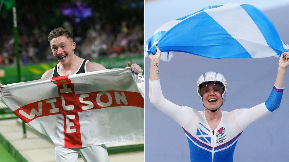 Nile Wilson and Katie Archibald hold up flags