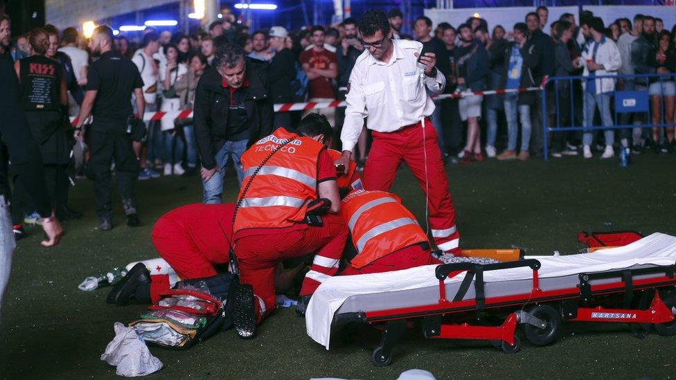 Paramedics treat Pedro Aunión Monroy