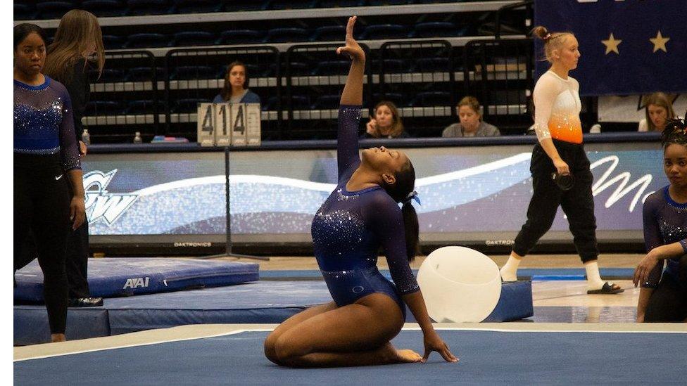 Morgan Price poses at the end of her routine