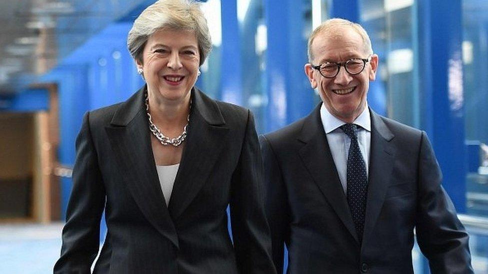 Theresa May with her husband Philip arriving at the conference venue