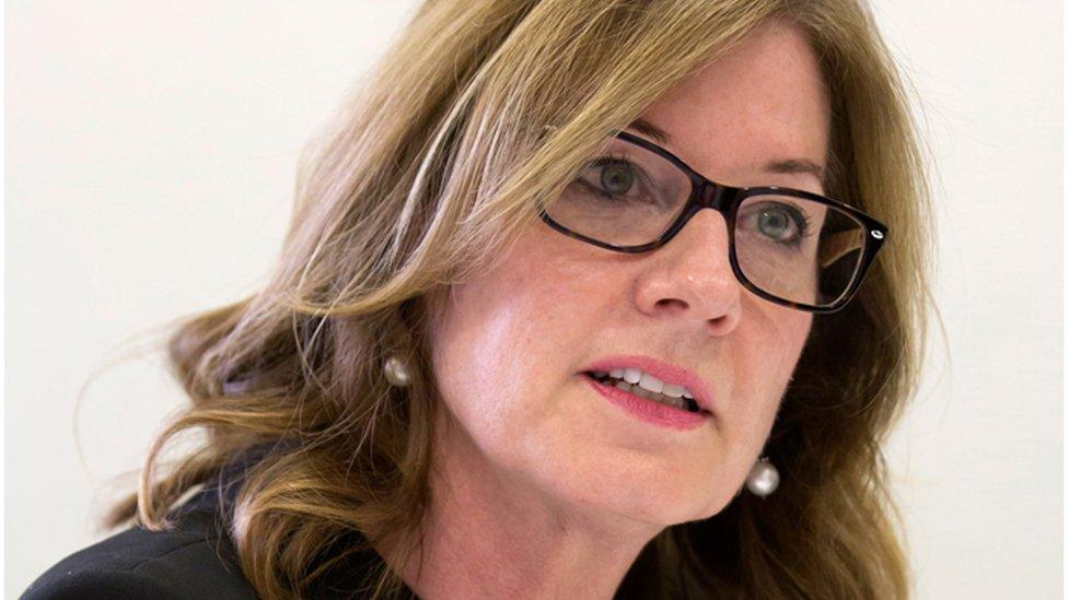 Elizabeth Denham in close-up against a white background