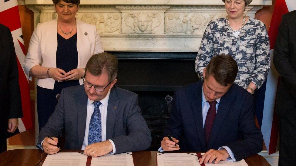 The deal was signed in Downing St by DUP MP Sir Jeffrey Donaldson and Tory Chief Whip Gavin Williamson