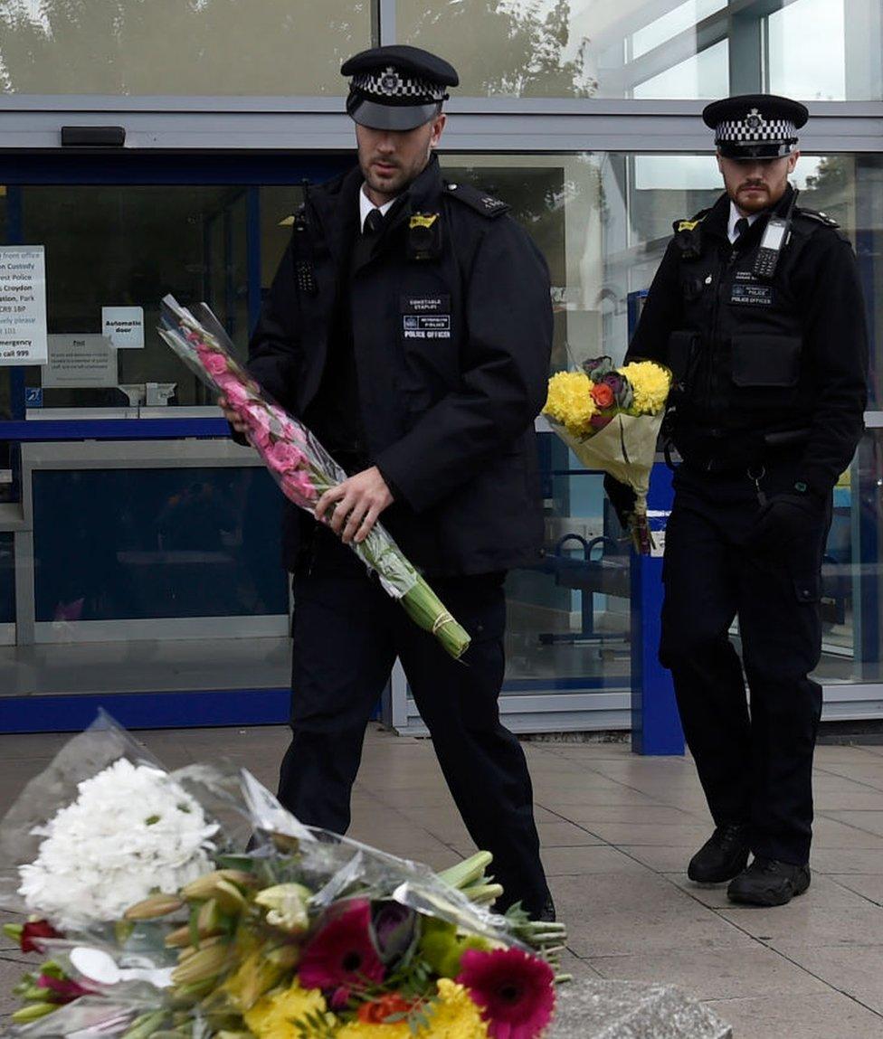 police with flowers