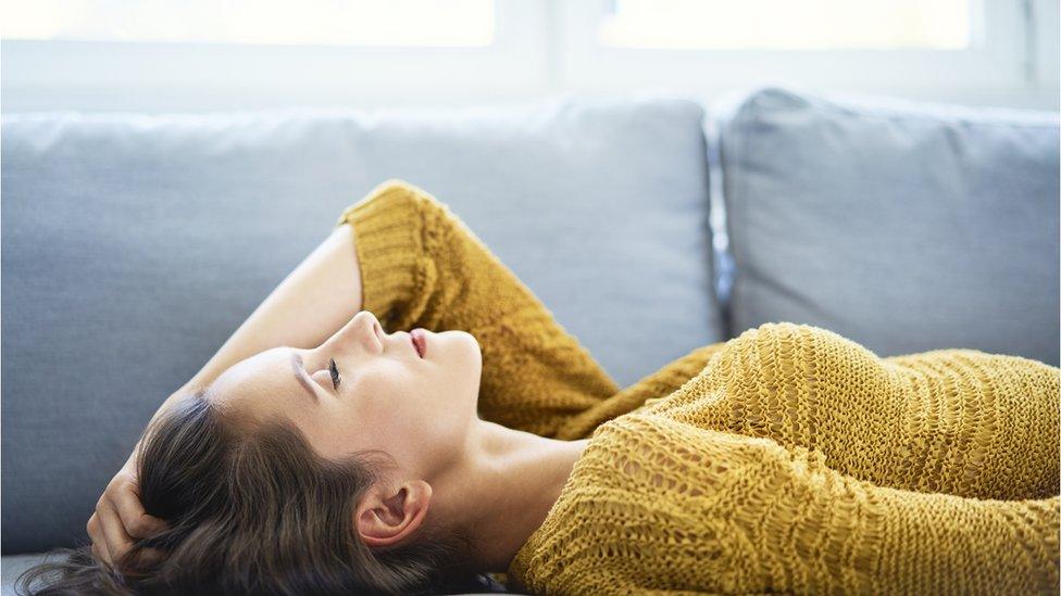 Woman on sofa