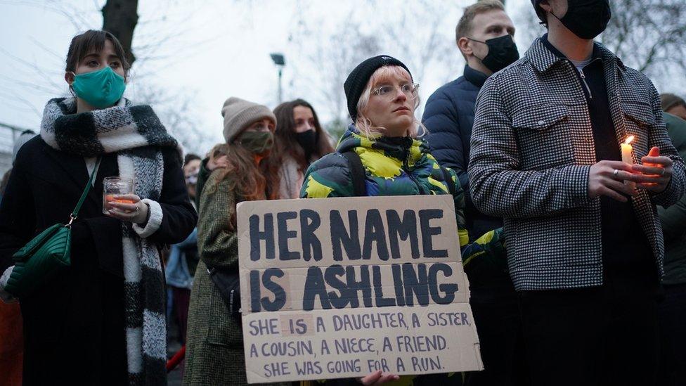 People hold a vigil outside the London Irish Centre in Camden in memory of murdered primary school teacher 23-year-old Ashling Murphy