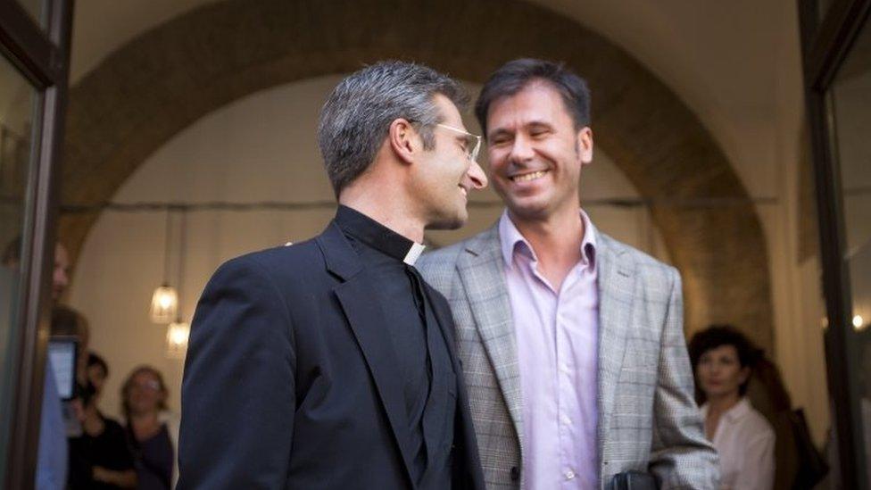 Monsignor Krzysztof Charamsa (left) and his partner Eduard in Rome (03 October 2015)