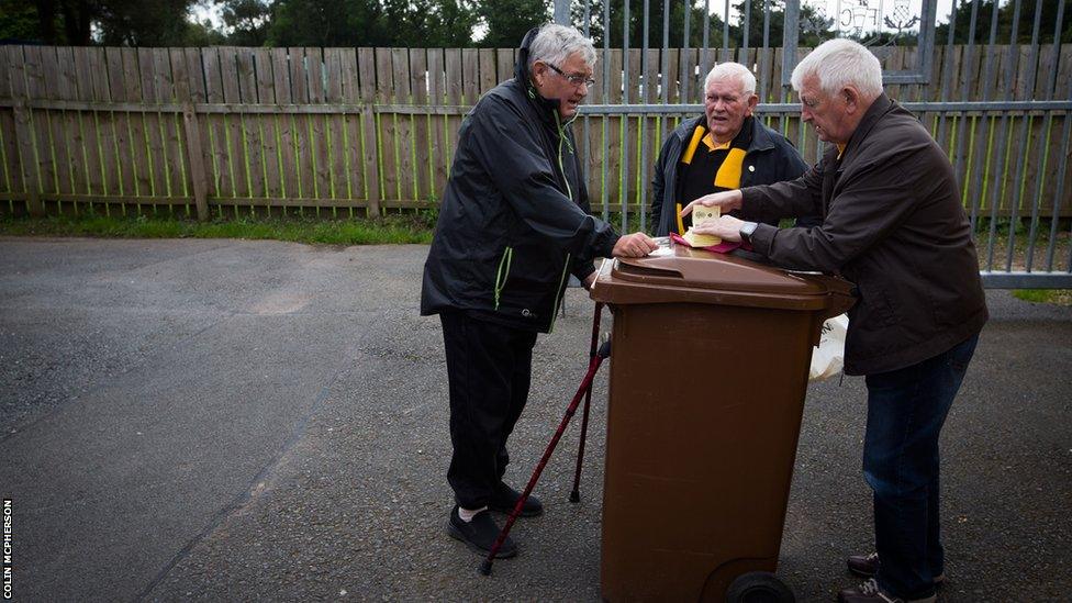 A half-time draw seller and some customers