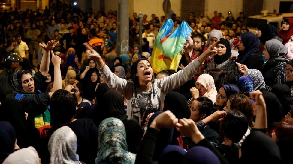 Women shout during a protest