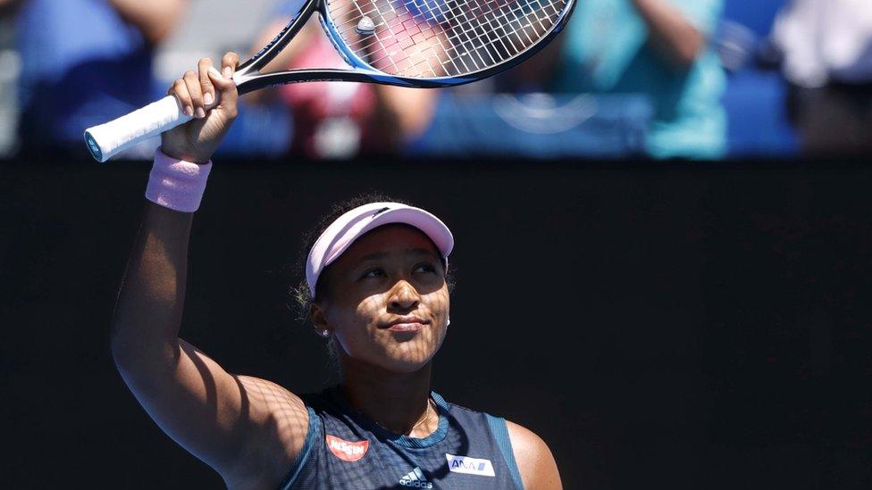 Japan's Naomi Osaka acknowledges the crowd after winning her match against Ukraine"s Elina Svitolina.