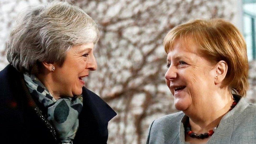 Theresa May and Angela Merkel