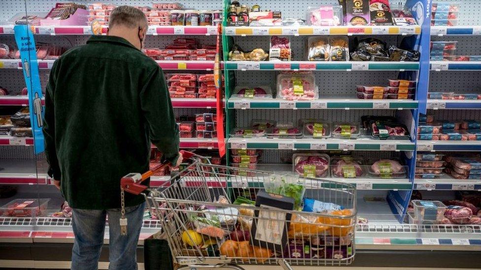 Man shopping in Sainsbury's