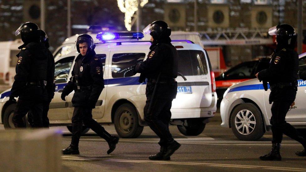 Armed officers respond to a shooting incident near the Federal Security Service (FSB) building in Moscow, 19 December 2019