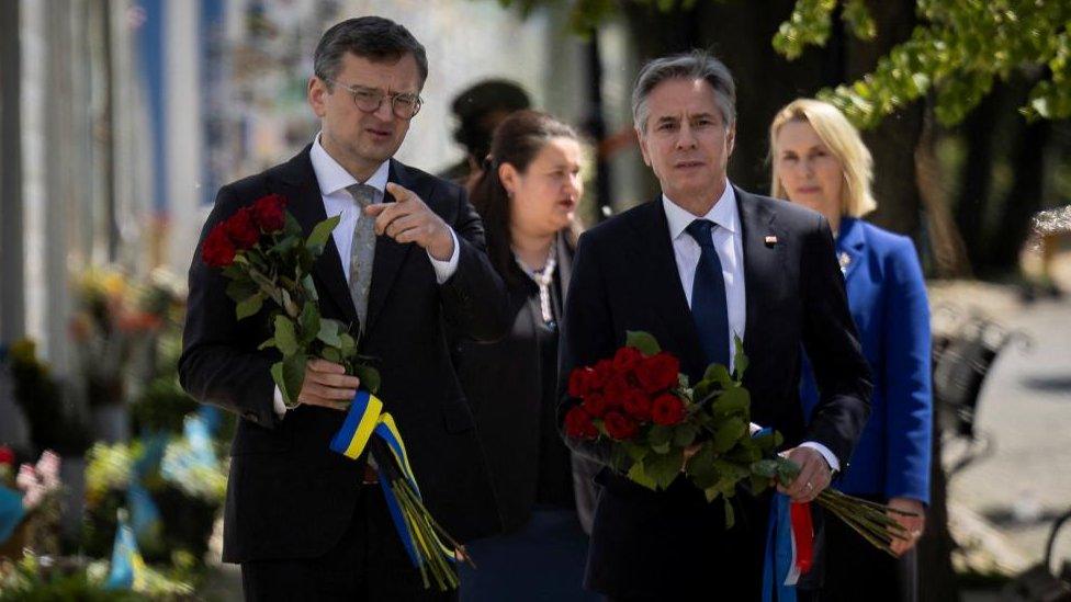 U.S. Secretary of State Antony Blinken and Ukrainian Foreign Minister Dmytro Kuleba attend a flower laying ceremony at the Wall of Remembrance, in Kyiv, Ukraine, May 15, 2024.