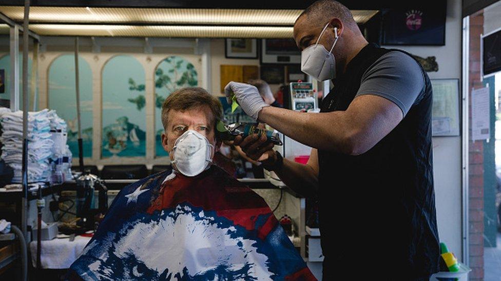 Man getting a haircut at barbers