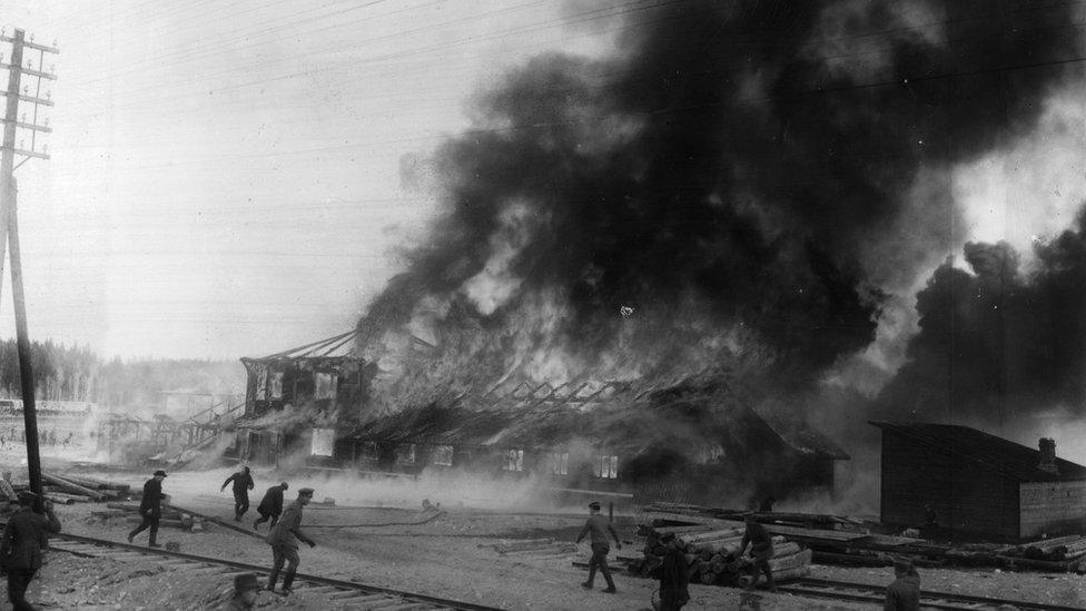 A communist base burns during the Finnish Civil War