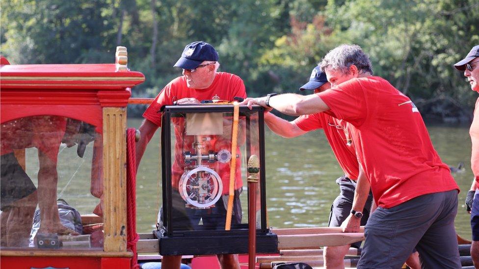 The optical atomic clock boards the Jubilant Trust flotilla at Isleworth riverside.