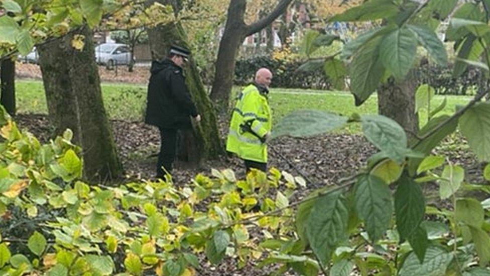 PCSO Alan Mitchell (right) with an officer