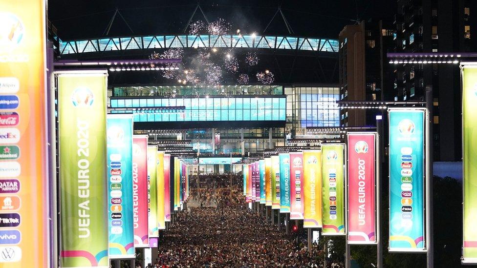 England fans leave Wembley Stadium, along Wembley way after England qualified for the Euro 2020 final where they will face Italy on Sunday 11th July, following the UEFA Euro 2020 semi final match between England and Denmark.