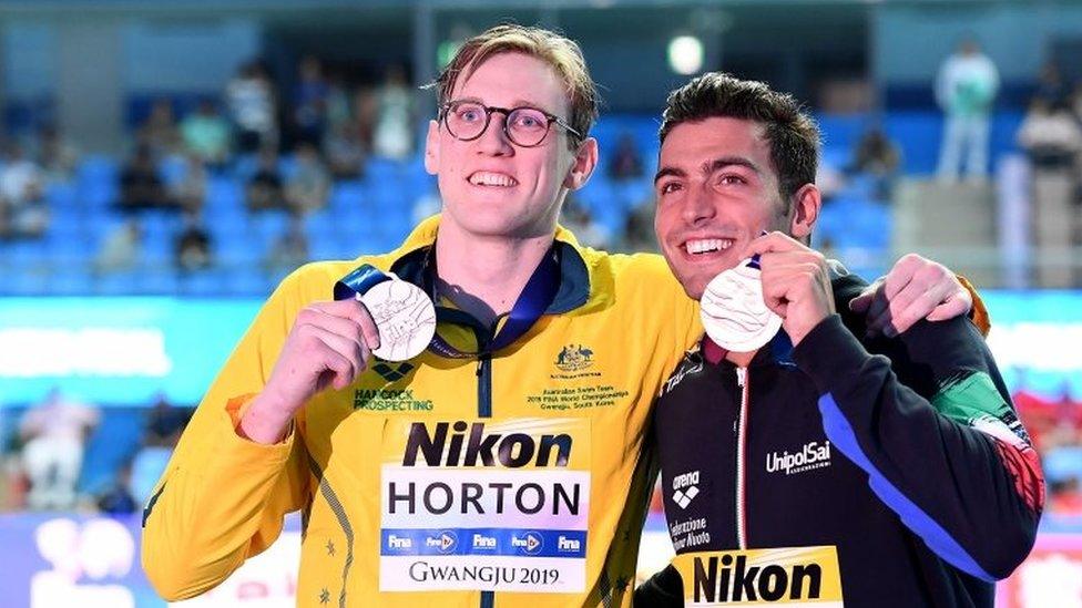 Horton later posed for photos with bronze medallist Gabriele Detti