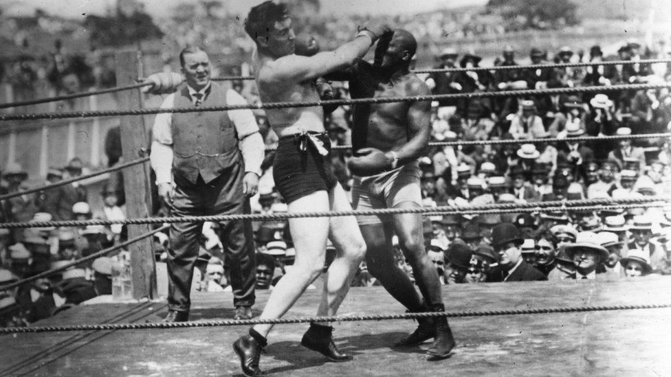 Jack Johnson , right, of the USA, world heavyweight title holder since 1908, in action against Jess Willard of the USA at Havana, Cuba in 1915. Willard took the title with a knock-out in the 26th round and held onto it until 1919