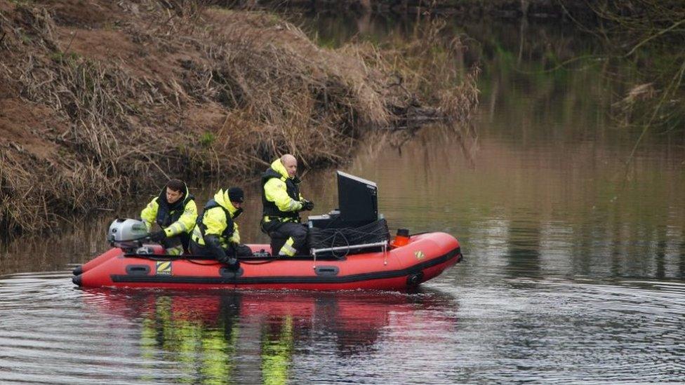 Workers from a private underwater search and recovery company, Specialist Group International, including CEO Peter Faulding (right) in St Michael's on Wyre, Lancashire