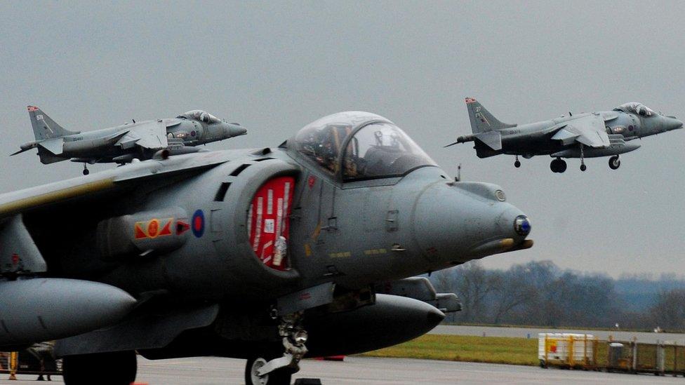 Harrier jump jets taking off at RAF Cottesmore in Oakham, as they carry out flypasts on what was billed as their "final flight" before the axe of Government spending cuts falls on them, as the RAF celebrates its centenary on Sunday.