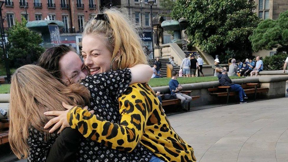 Spearmint Rhino dancers celebrate outside Sheffield Town Hall