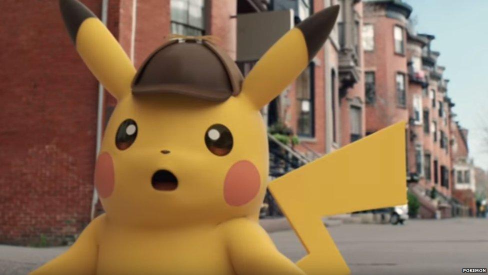 Pikachu wearing a brown hat