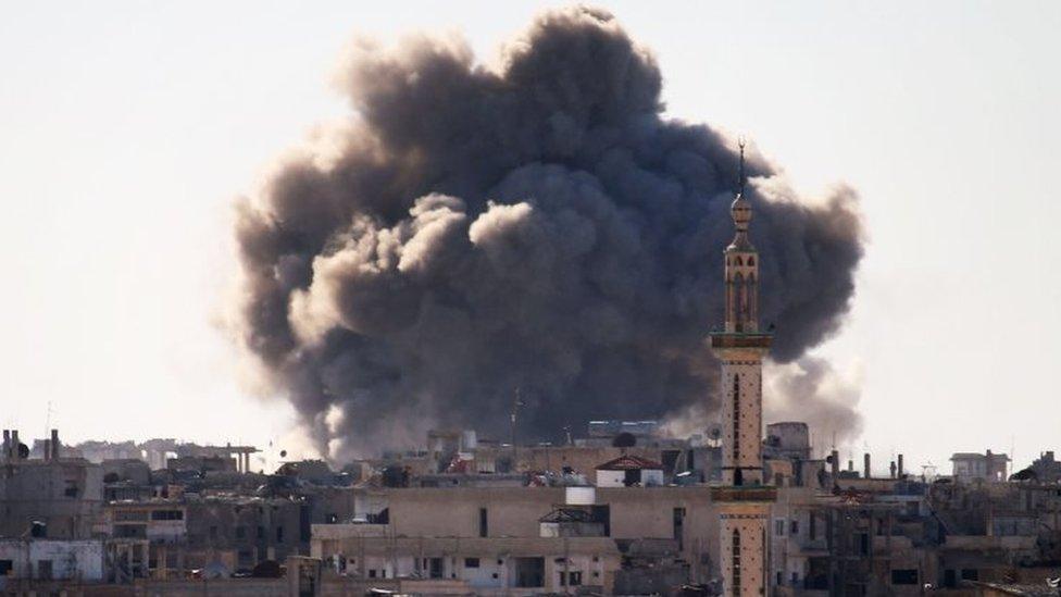 Smoke billows over a rebel-held area of Deraa, southern Syria, after a reported air strike. Photo: 19 February 2017