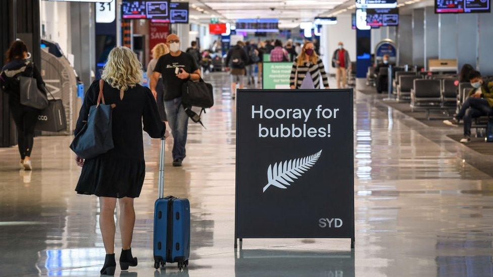 Travellers in the International departures lounge at Sydney Airport before departing for New Zealand on April 19, 2021 in Sydney, Australia.