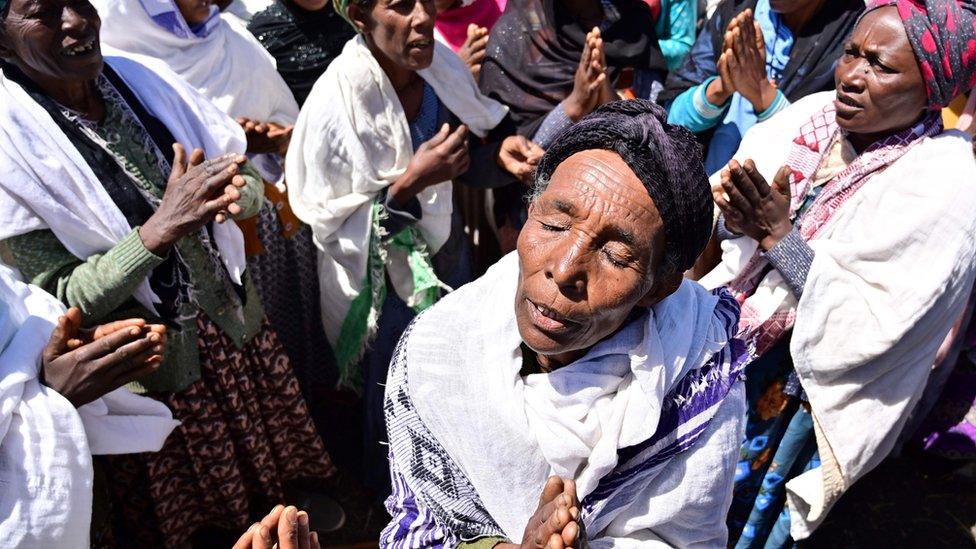 Mourners at the crash site