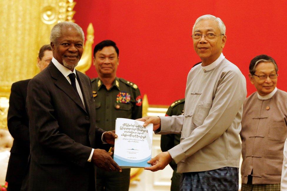 Myanmar's President Htin Kyaw (R) receives a finalized report from the Advisory Commission on Rakhine State from former United Nations (UN) Secretary General Kofi Annan (L) during their meeting at the Presidential House in Naypyitaw, Myanmar, 23 August 2017.