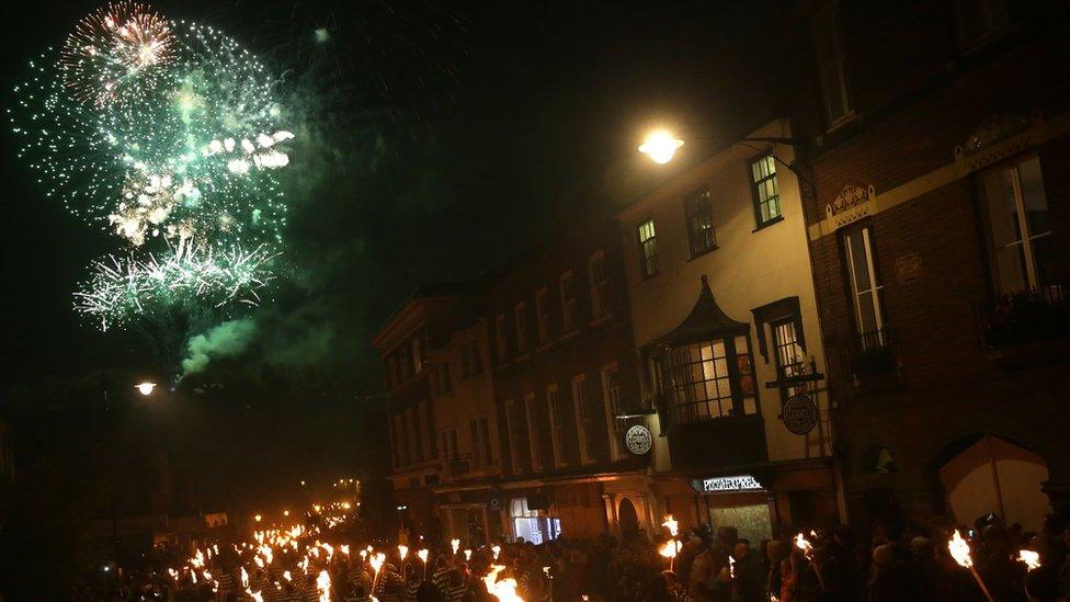 Fireworks over Lewes as a torchlight parade marches the streets