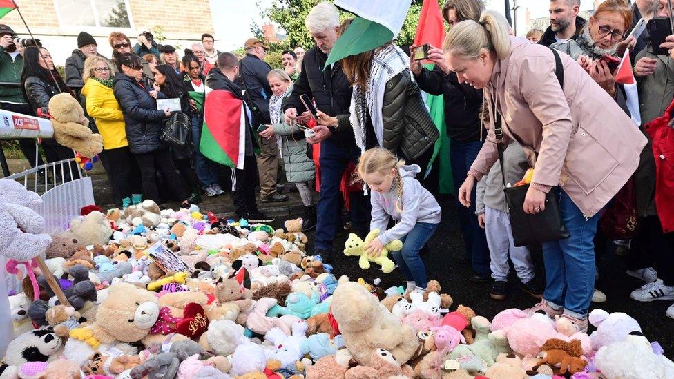 Teddy bears outside the US Consulate gates