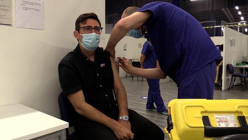 Mayor of Greater Manchester Andy Burnham receiving his second dose of the Oxford AstraZeneca COVID-19 vaccination at the vaccine clinic set up in the Etihad Stadium, Manchester