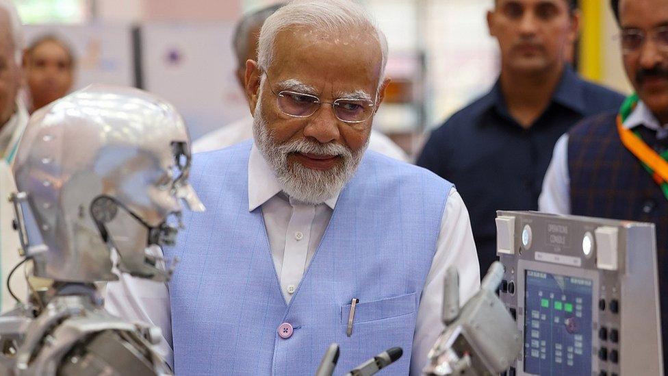 Narendra=Modi-with-robot.