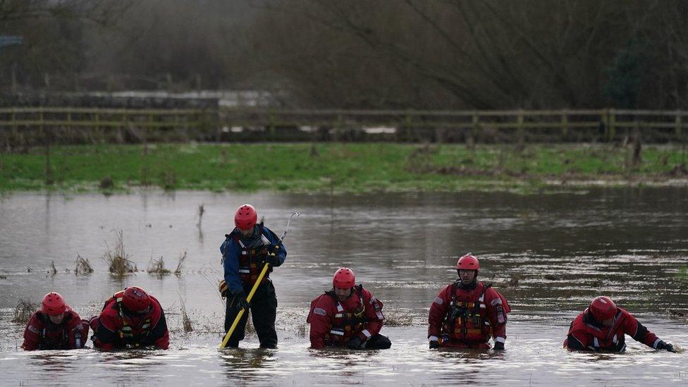 Search teams in the water