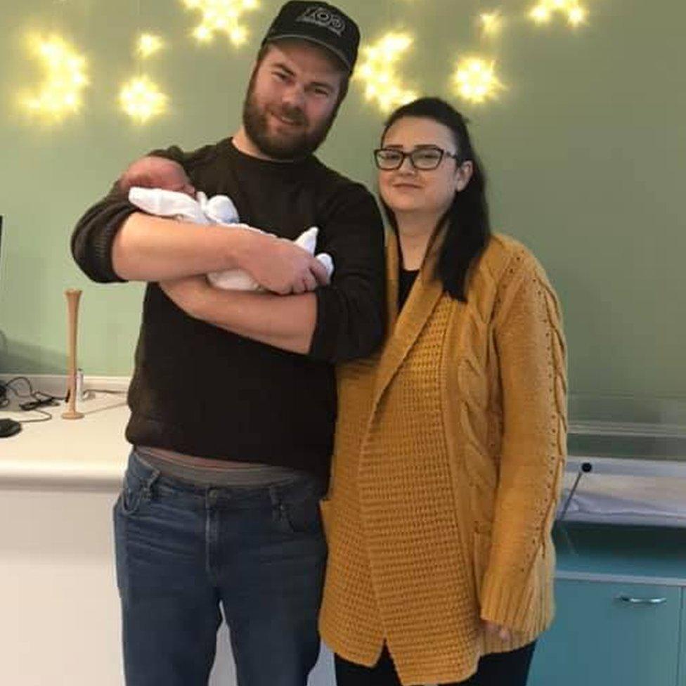 Parents Helen Jewell and Tom Brooks with Poppy