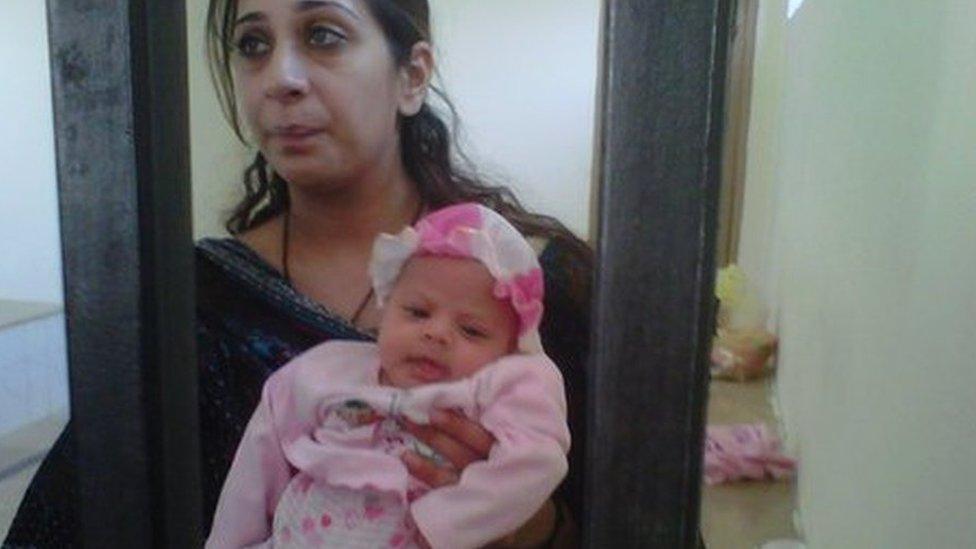 Khadija Shah with her baby