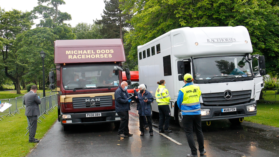 BHA Officials check horse-boxes as they arrive at Ayr for Scotland's first meeting back since the resumption of Racing.