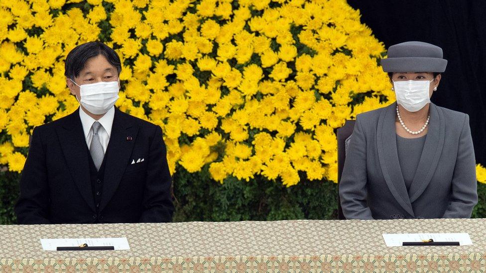 Japan's Emperor Naruhito (L)